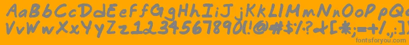 フォントCommotion Business – オレンジの背景に灰色の文字