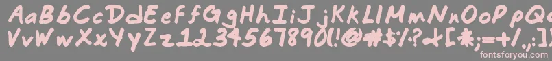 Commotion Business Font – Pink Fonts on Gray Background