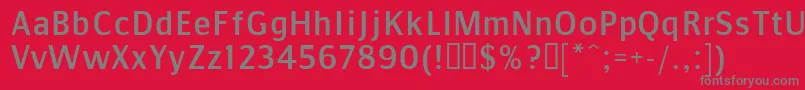 フォントCOMMS    – 赤い背景に灰色の文字