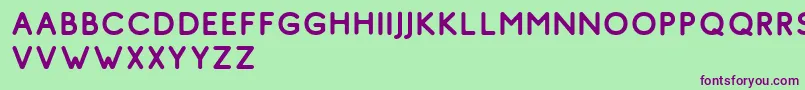 フォントComodo Regular Free – 緑の背景に紫のフォント