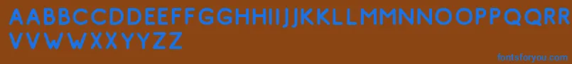 フォントComodo Vintage Free – 茶色の背景に青い文字