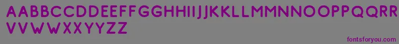 フォントComodo Vintage Free – 紫色のフォント、灰色の背景