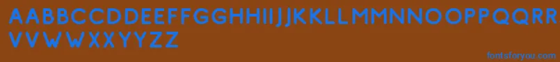フォントComodo Vintage Free – 茶色の背景に青い文字