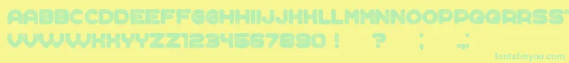 Complained-Schriftart – Grüne Schriften auf gelbem Hintergrund