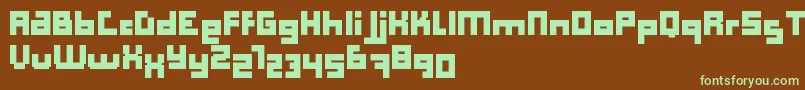 フォントComputer Aid   Bold   Dker – 緑色の文字が茶色の背景にあります。