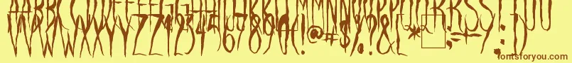 フォントRavenSong – 茶色の文字が黄色の背景にあります。