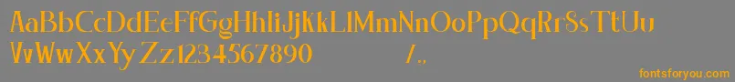 フォントConcetta Kalvani Serif Block – オレンジの文字は灰色の背景にあります。