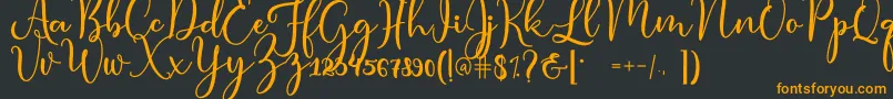 condita Font – Orange Fonts on Black Background