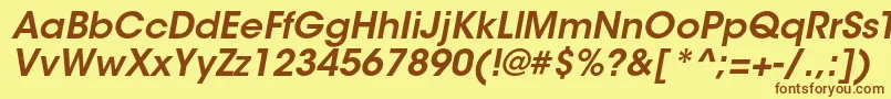 フォントItcavantgardestdDemiobl – 茶色の文字が黄色の背景にあります。