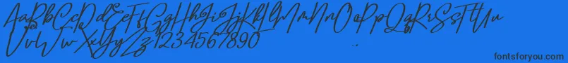 Confidante-Schriftart – Schwarze Schriften auf blauem Hintergrund