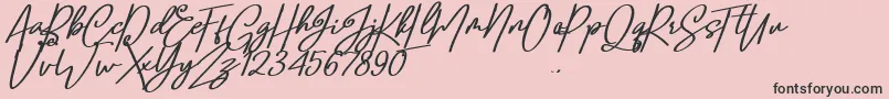 Confidante-Schriftart – Schwarze Schriften auf rosa Hintergrund