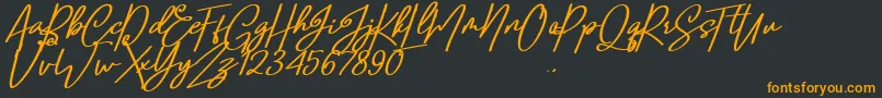 Confidante-Schriftart – Orangefarbene Schriften auf schwarzem Hintergrund