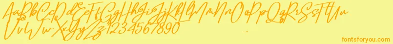 Confidante-Schriftart – Orangefarbene Schriften auf gelbem Hintergrund