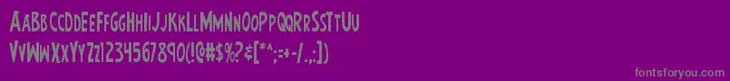 Earthsmightiestcond-fontti – harmaat kirjasimet violetilla taustalla