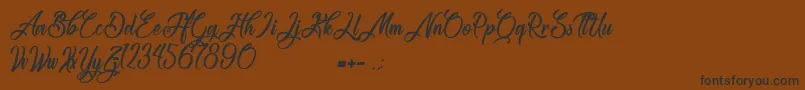 Congratulation Folding Font – Black Fonts on Brown Background