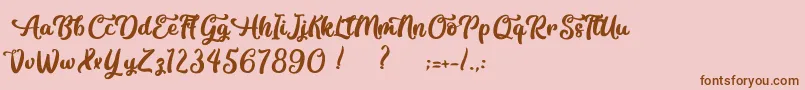 Contemplation-Schriftart – Braune Schriften auf rosa Hintergrund