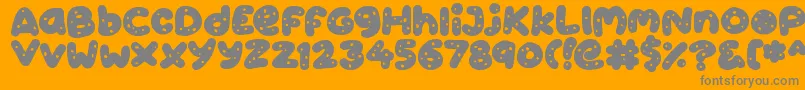 Cookies-Schriftart – Graue Schriften auf orangefarbenem Hintergrund