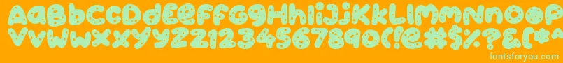 Cookies-Schriftart – Grüne Schriften auf orangefarbenem Hintergrund