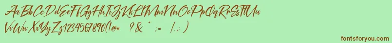 Coral Pen Free Font – Brown Fonts on Green Background