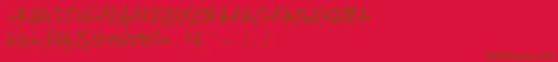 Fonte Coral Pen Free – fontes marrons em um fundo vermelho