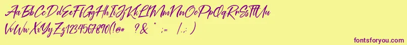 Coral Pen Free Font – Purple Fonts on Yellow Background