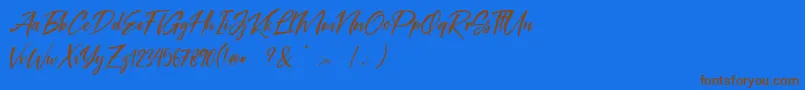 フォントCoral Pen Free – 茶色の文字が青い背景にあります。