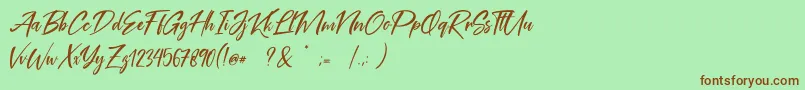 フォントCoral Pen Free – 緑の背景に茶色のフォント