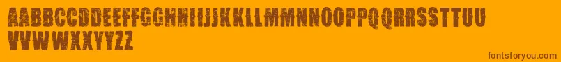 VtksDesgaste-Schriftart – Braune Schriften auf orangefarbenem Hintergrund