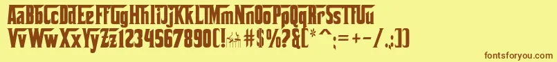 フォントCorleone – 茶色の文字が黄色の背景にあります。