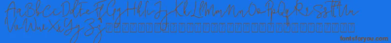 フォントCorline Signature – 茶色の文字が青い背景にあります。
