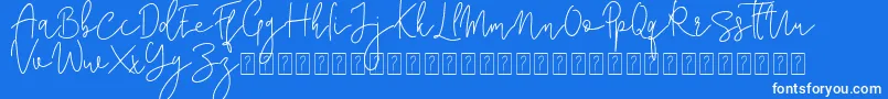 フォントCorline Signature – 青い背景に白い文字