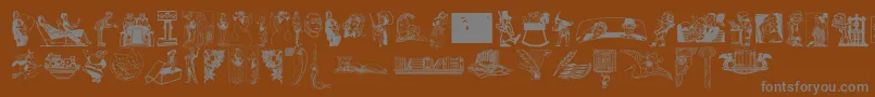 Cornucopia of Dingbats Font – Gray Fonts on Brown Background