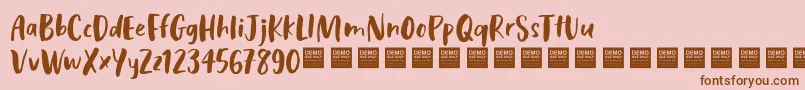 Cosmic Rays   Demo Font – Brown Fonts on Pink Background