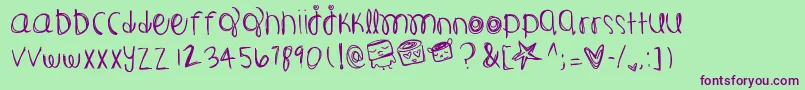 cosmicJourney Font – Purple Fonts on Green Background