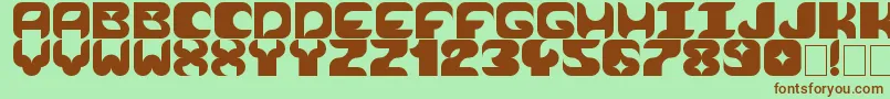 Cosmik Orchestra-fontti – ruskeat fontit vihreällä taustalla