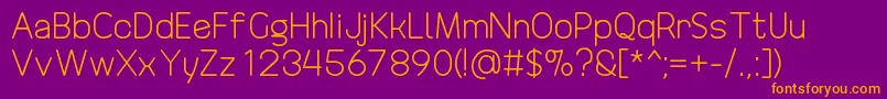 DrakoheartRevofitOriginal Font – Orange Fonts on Purple Background