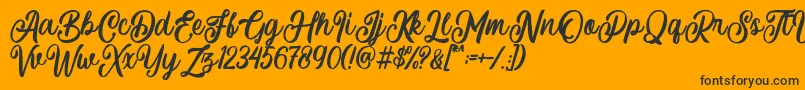 Courtland-Schriftart – Schwarze Schriften auf orangefarbenem Hintergrund