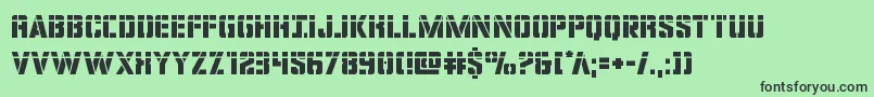 フォントcovertopslaser – 緑の背景に黒い文字