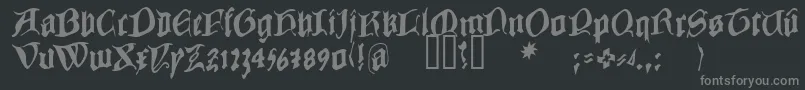 フォントCOWBC    – 黒い背景に灰色の文字