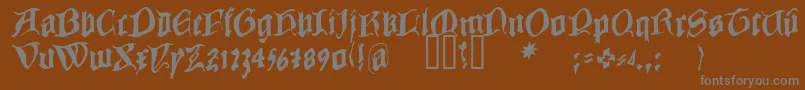 フォントCOWBC    – 茶色の背景に灰色の文字