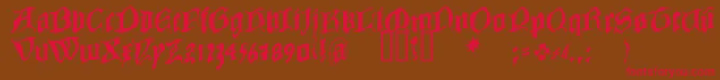 フォントCOWBC    – 赤い文字が茶色の背景にあります。