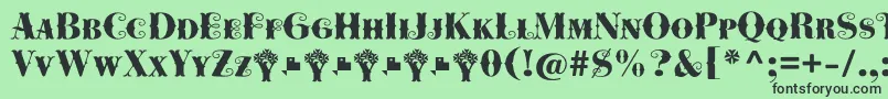 Cowboya Bifurcated-Schriftart – Schwarze Schriften auf grünem Hintergrund