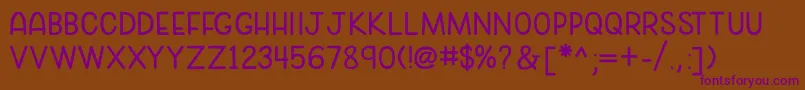 cozy caps Font – Purple Fonts on Brown Background