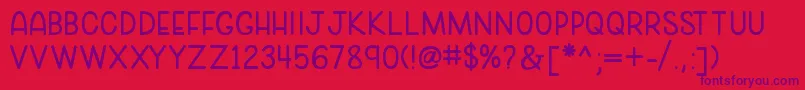 cozy caps Font – Purple Fonts on Red Background