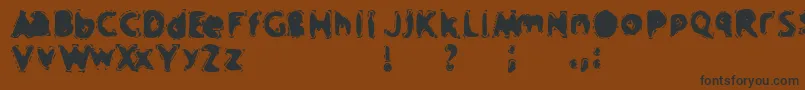 CRAPM   -Schriftart – Schwarze Schriften auf braunem Hintergrund