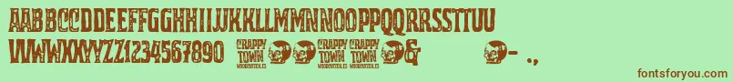 Crappy Town-fontti – ruskeat fontit vihreällä taustalla