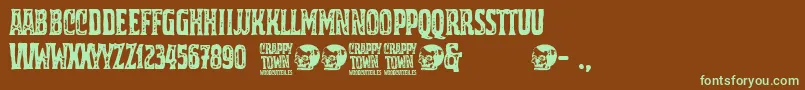 Czcionka Crappy Town – zielone czcionki na brązowym tle