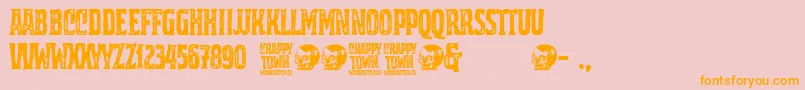 Crappy Town-fontti – oranssit fontit vaaleanpunaisella taustalla