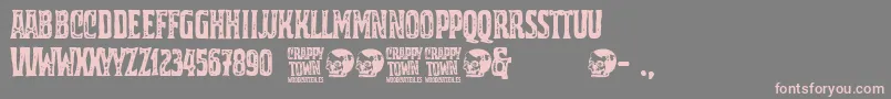 Crappy Town-fontti – vaaleanpunaiset fontit harmaalla taustalla