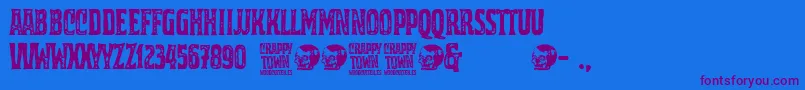 Crappy Town Font – Purple Fonts on Blue Background
